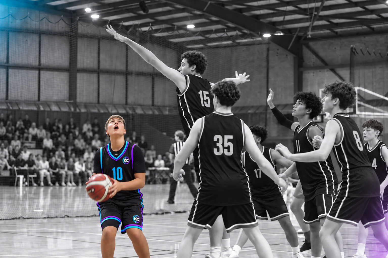 Luca attacking the basket in a KC creative photo